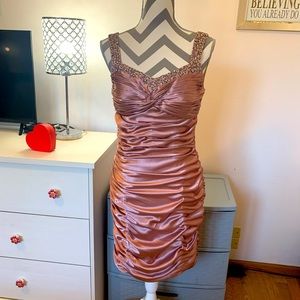 Bling sets off dusty rose pre-worn evening dress in pristine condition.